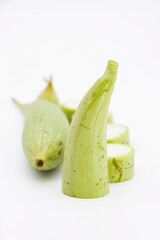 fresh loofah or Sponge Gourd or Vegetable Sponge with slice isolate on white background