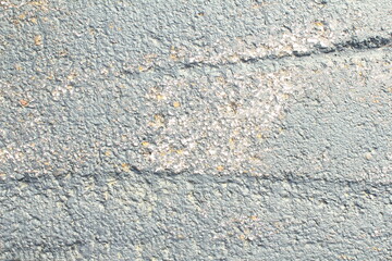scratches and damaged parking lot,road or driveway need for repairing 