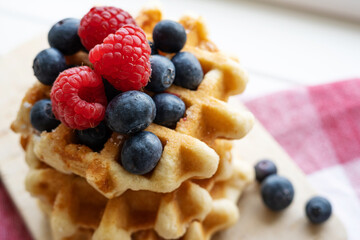 Close-up of homemade waffles with berries.