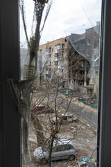 War between Russia and Ukraine. View from the window to the burnt house