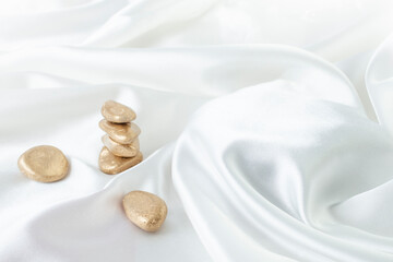Stacked golden Zen stones product photography background, stand or podium pedestal , luxury advertising display 