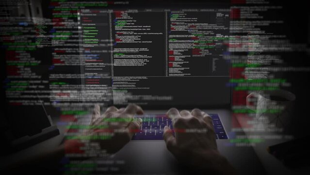 Programmer or Hacker hands writing code. Busy man working on latest innovative sophisticated technology laptop or computer keyboard with augmented reality holograms. Internet of Things,  AR, Security.