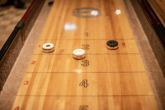 Playing the game of shuflleboard..