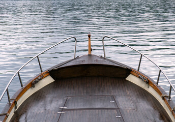 bow of a vintage motorboat in fine wood