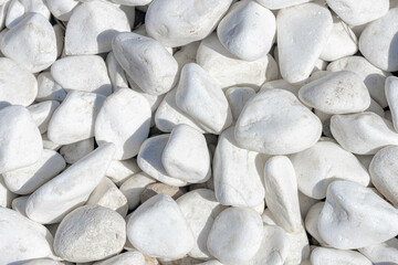 Selective focus of white pebble pattern, White grey gravel surface, Natural stone floor in the...