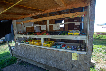 Fototapeta na wymiar Roadside Stand with Fresh Assorted Produce | Holmes County, Ohio