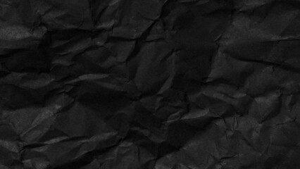 Black crumpled paper texture background