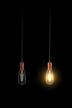 Realistic light bulb. Retro light. Turned off and glowing yellow incandescent lamp. Light background. Isolated in black