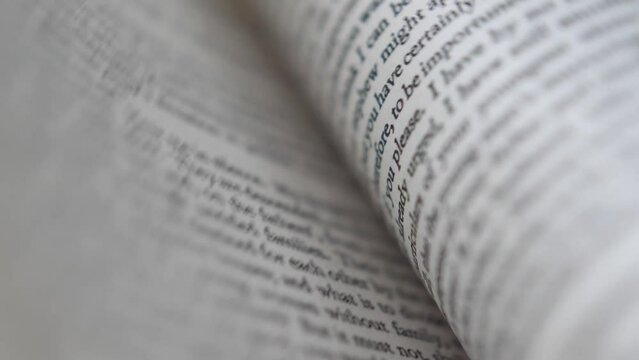 Flicking quickly through book pages