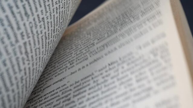 Flicking quickly through book pages