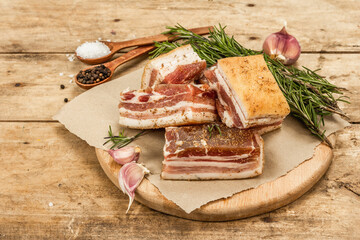 Pieces of salty high-fat meat cooked with spices. Salo, bacon, lard, silverside, gammon
