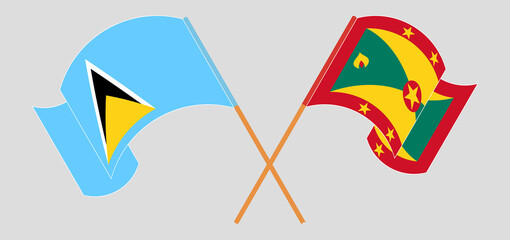 Crossed and waving flags of Saint Lucia and Grenada