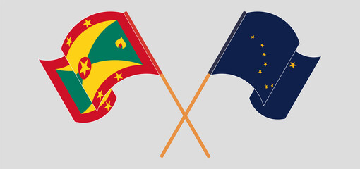 Crossed and waving flags of Grenada and the State of Alaska