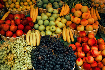 Fresh fruits. beautifully organized fruits on the counter of the marketplace. greengrocery shop