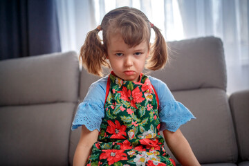 Moody little girl feeling angry and unsatisfied - 502482522