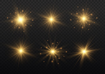 Naklejka premium Yellow sparks sparkle, golden star rays, sun light