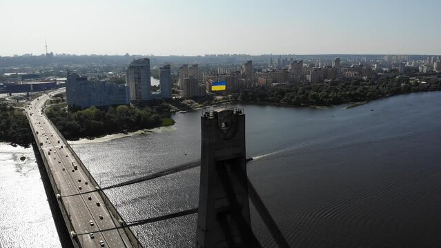 ukrainian flag overlooking the dnieper and obolon