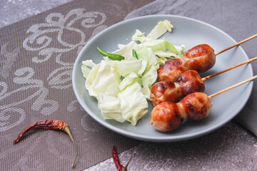 Grilled fermented pork and sticky rice sausage or Sausage Northeastern Style, What we call 