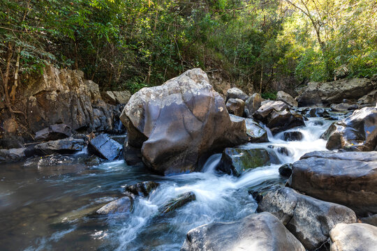 rocks in creek or stream flowing water