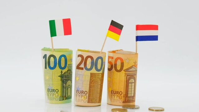 Economy of European countries.Changes in the budget of European countries. Flags of Germany,France and Italy on a white background.euro money inflation. Inflation and economic recession in Europe.