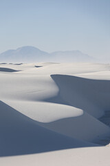 Fototapeta na wymiar Rolling dunes of gypsum sand in White Sands National Park