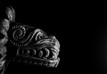 Macro close up photograph of a Quetzalcoatl, deity in Aztec culture