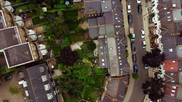 Aerial view of small houses and yards in Balham, London.