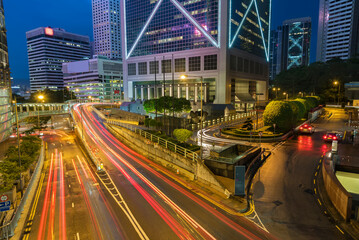 Fototapeta na wymiar Traffic in downtown district of Hong Kong city at night