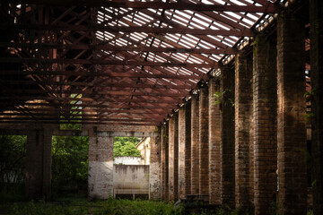 Old abandoned industrial building interior 