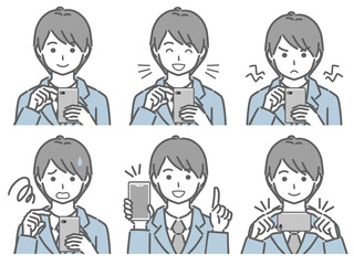 スマホを操作するスーツの若い男性