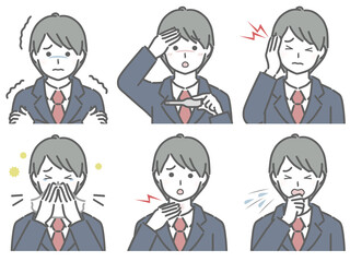 風邪の症状が出ているスーツの若い男性