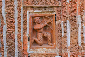 Terracotta art works on the temple walls of Lalji temple of Kalna, West Bengal, India - It is one of oldest temples of lord Krishna (a Hindu God). It is a famous artwork made of burnt bricks.