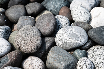 Fototapeta na wymiar Large round rocks on a beach