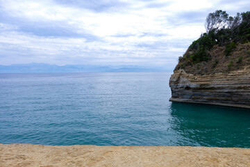 Fototapeta premium Beautiful view of picturesque sea and cliff at resort