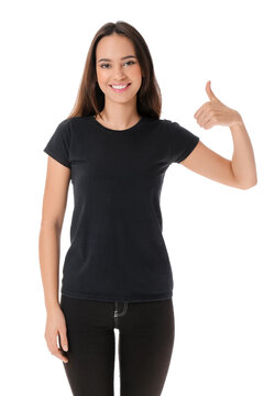 Pretty young woman in stylish t-shirt showing thumb-up on white background