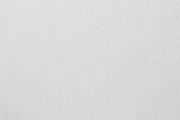 Clean white paper texture, cement or concrete wall texture background, empty space for text.