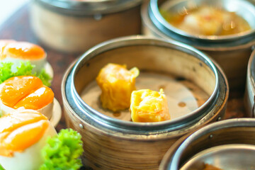 Chinese dim sum in a bamboo steamer box