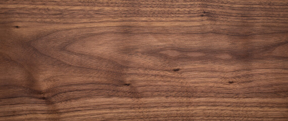 Walnut wood plank texture background.