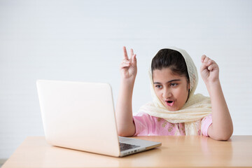muslim girl finger counting gesture and video call to someone for online learning class, education concept