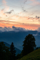 Dawn in the mountains, clouds covered the slopes of the Carpathians.