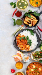 Indian food assortment on light background.