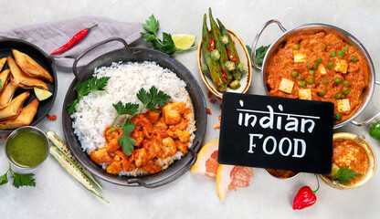 Indian food assortment on light background.