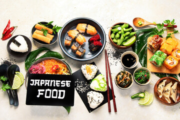 Japanese food assortment on light background.