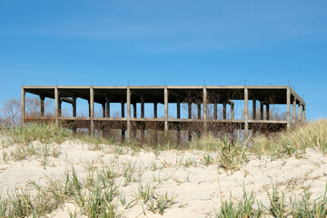 Concrete frame of multi-storey building. Selective focus.