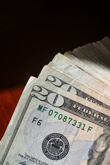 stack of twenty dollars banknotes, close up, front side