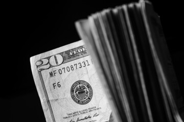 stack of twenty dollars banknotes, close up, front side