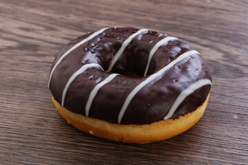 Glazed sweet tasty chocolate donut