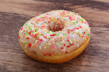 Sweet glazed vanilla donut with icing