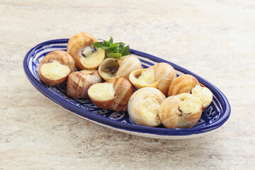Delicous baked snail with butter - Escargot
