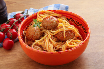 Spaghetti with meatball in tomato sause